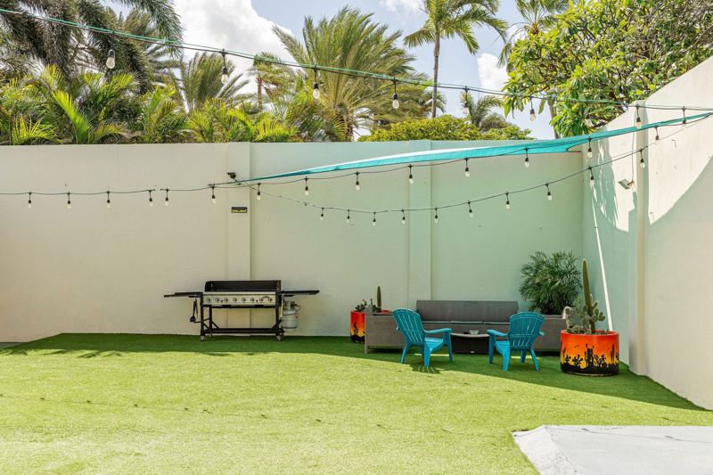 Courtyard lawn with string lights