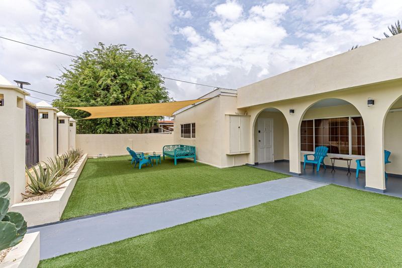 Property overview with arches and shade sails